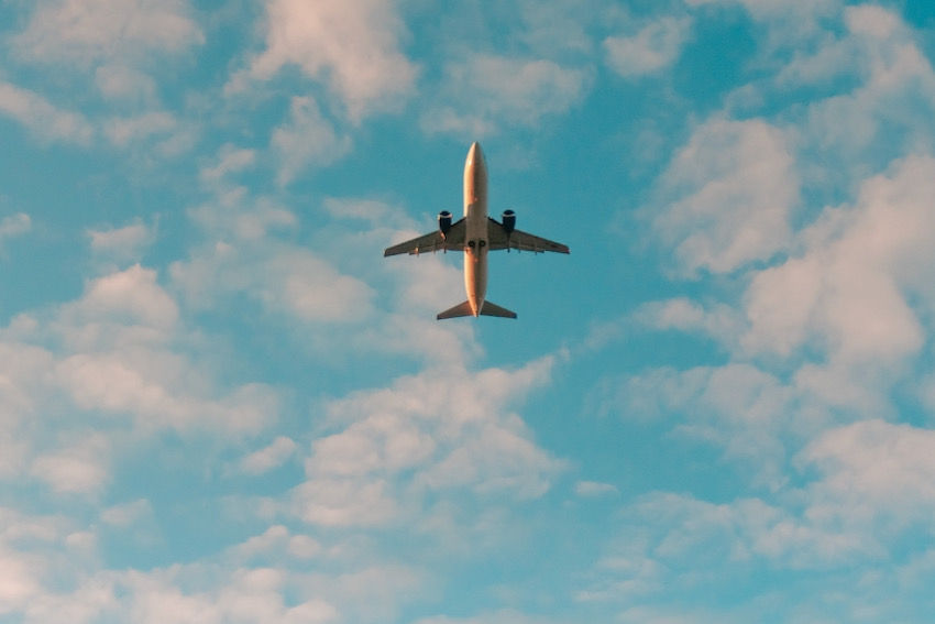 aircraft from below blue skies