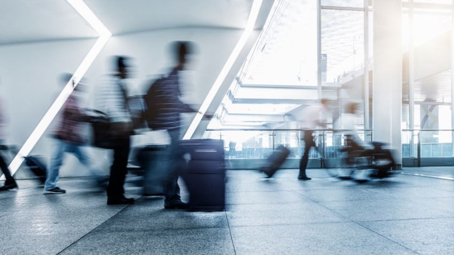 Airport passengers blurred